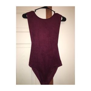 Purple body suit